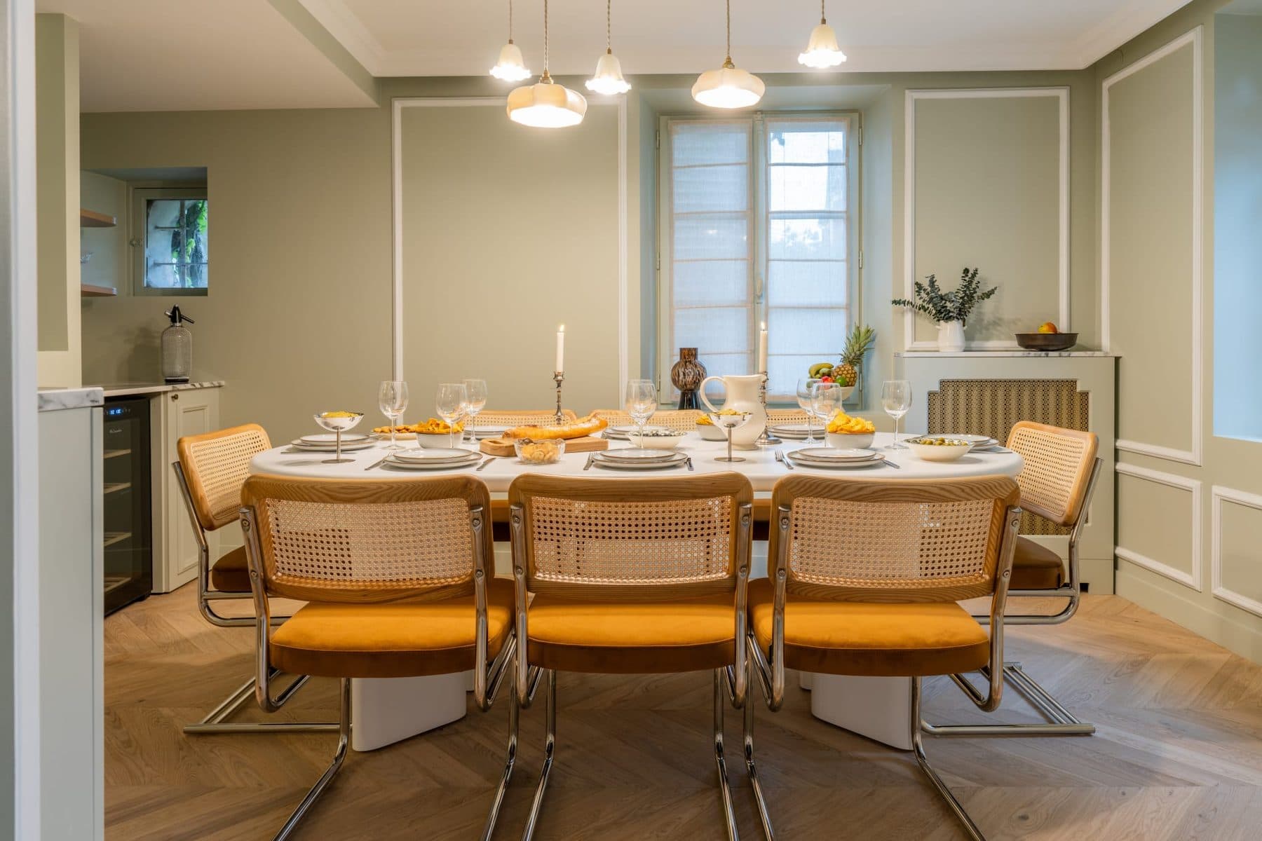 Bright dining room with a large oval table